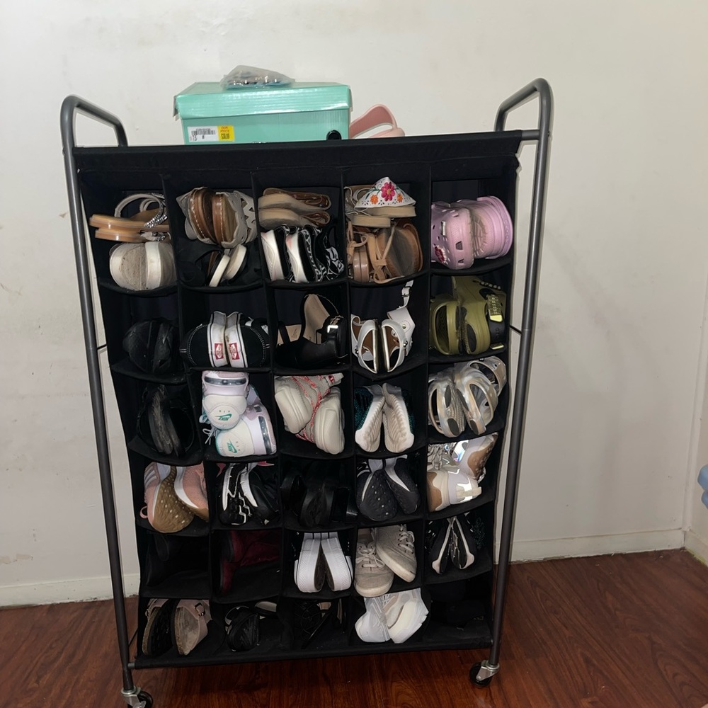 Rolling Shoe organizer. (Shoes not included) Has 30 slots.